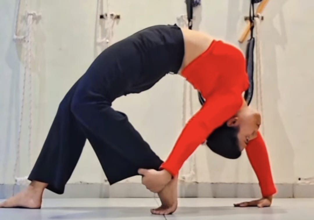 Aerial sling supported backbend