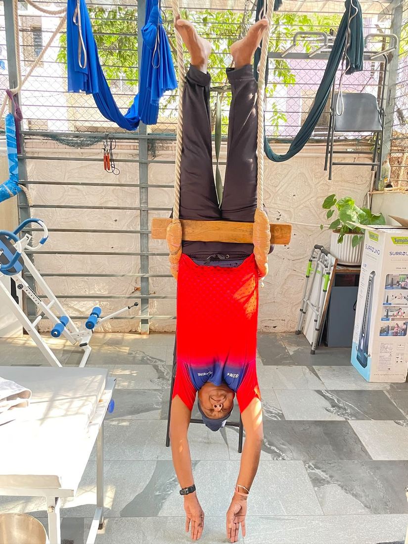 Full aerial hang inversion using a wooden bar