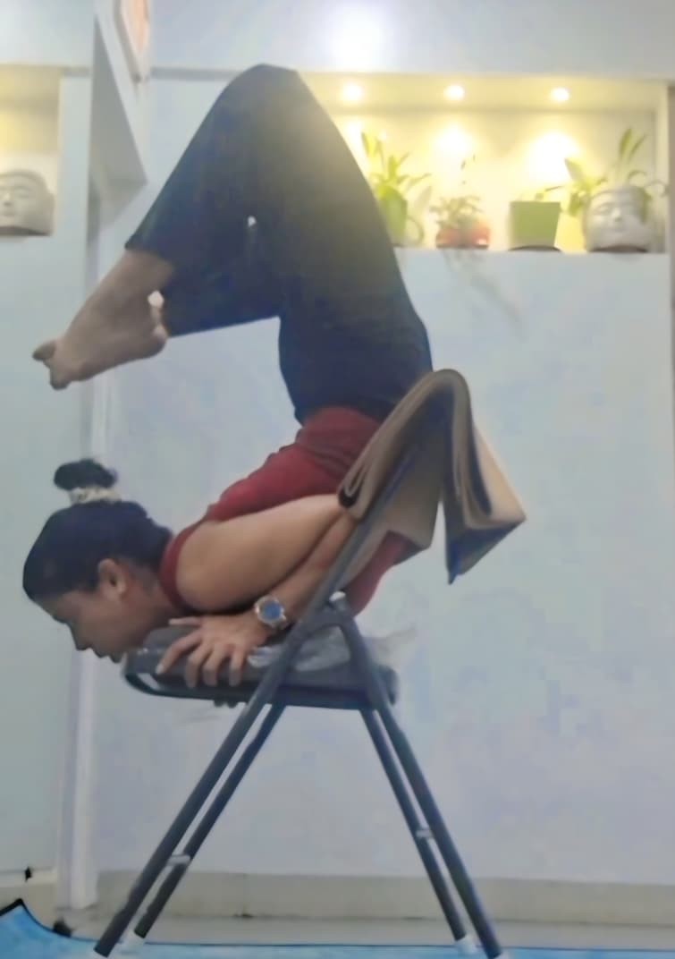 Chair asana with side stretch